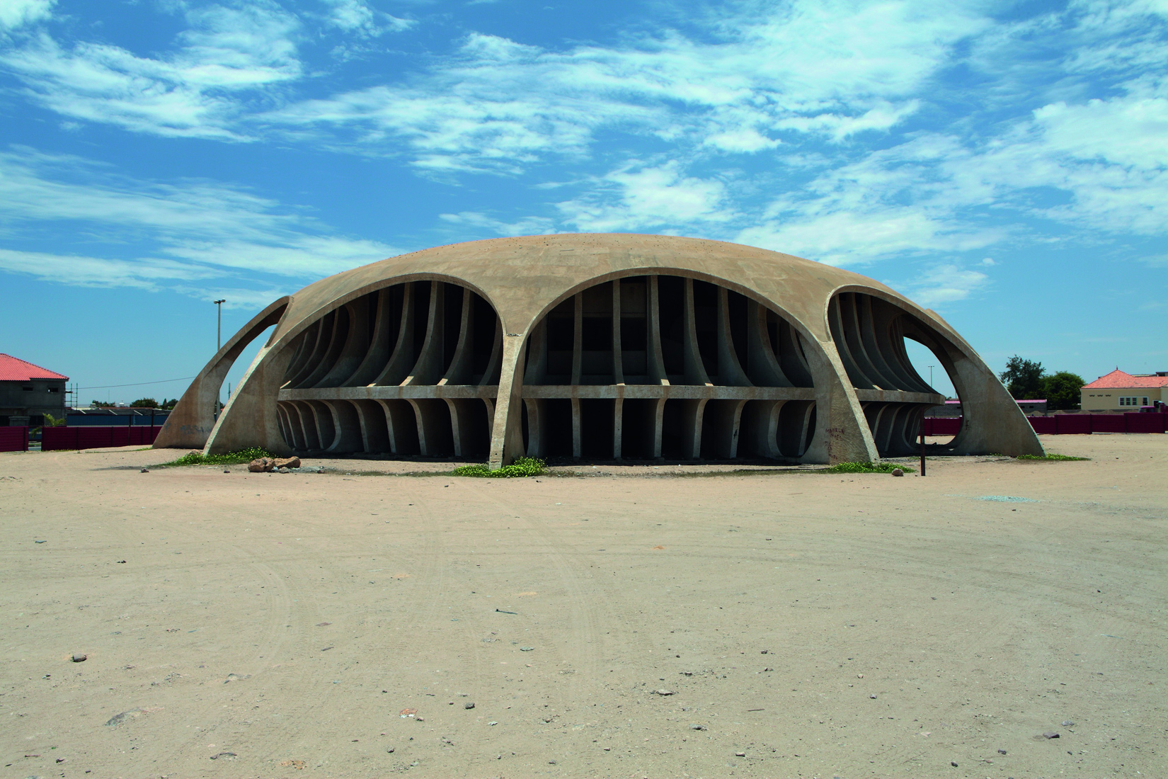 Designed by Botelho Vasconcelos of Atelier Boper, Cine Estudio in Namibe, Provincia Namibe, was never completed. While it currently lies in poor condition, a rehabilitation project is underway. Photography: Walter Fernandes/Goethe-Institut Angola