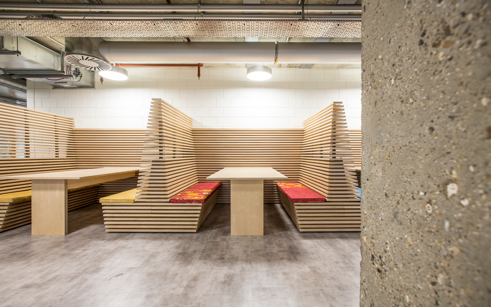 Breakout booths made from slatted plywood