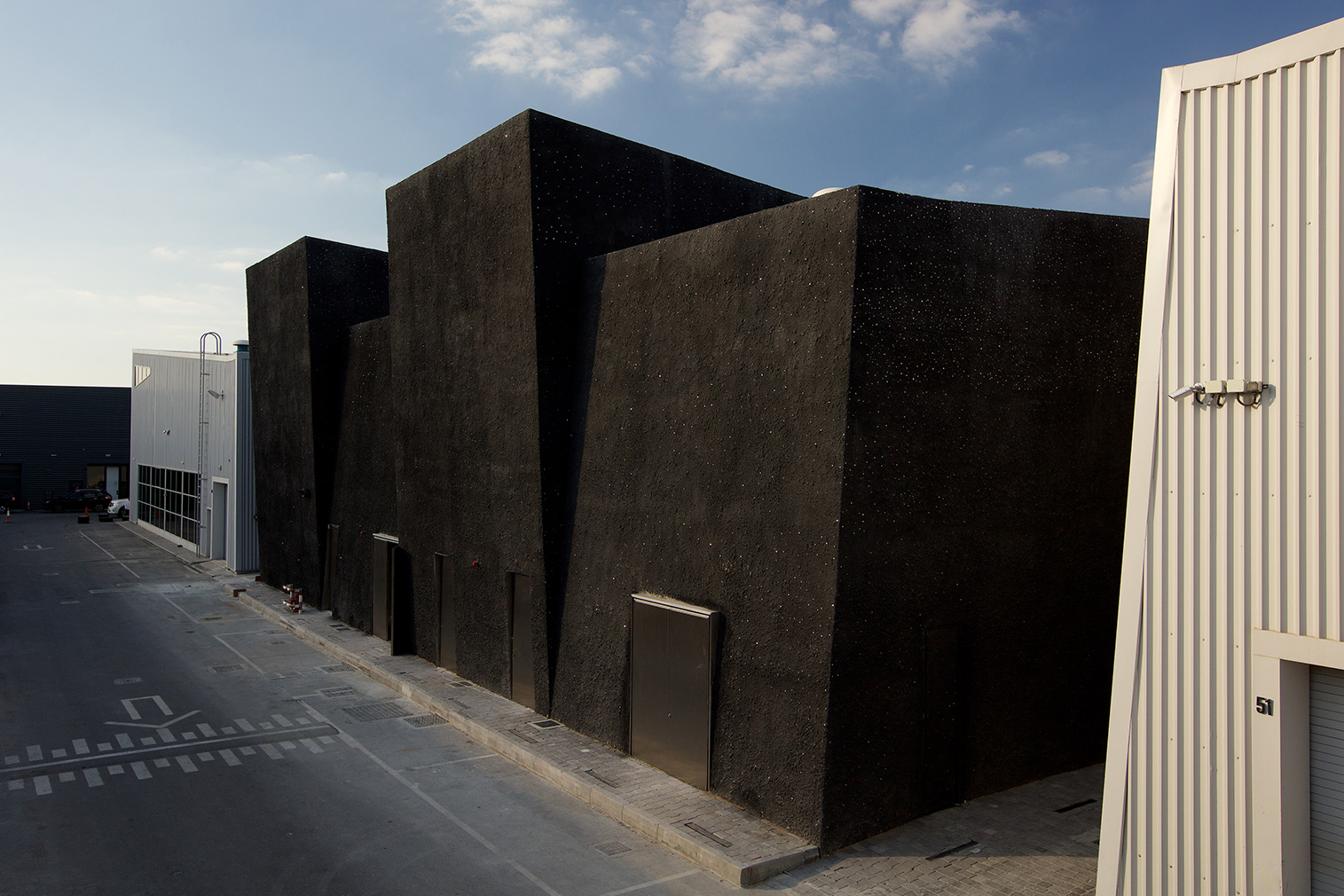 Concrete cultural space by OMA on Dubai's Alserkal Avenue