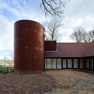 Steel tower extension. Modern extension meets 19th C stone cottage. Gasworks Cottage by Chris Dyson Architects. Photography: Peter Landers