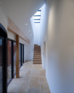 Inside Modern extension meets 19th C stone cottage. Gasworks Cottage by Chris Dyson Architects. Photography: Peter Landers