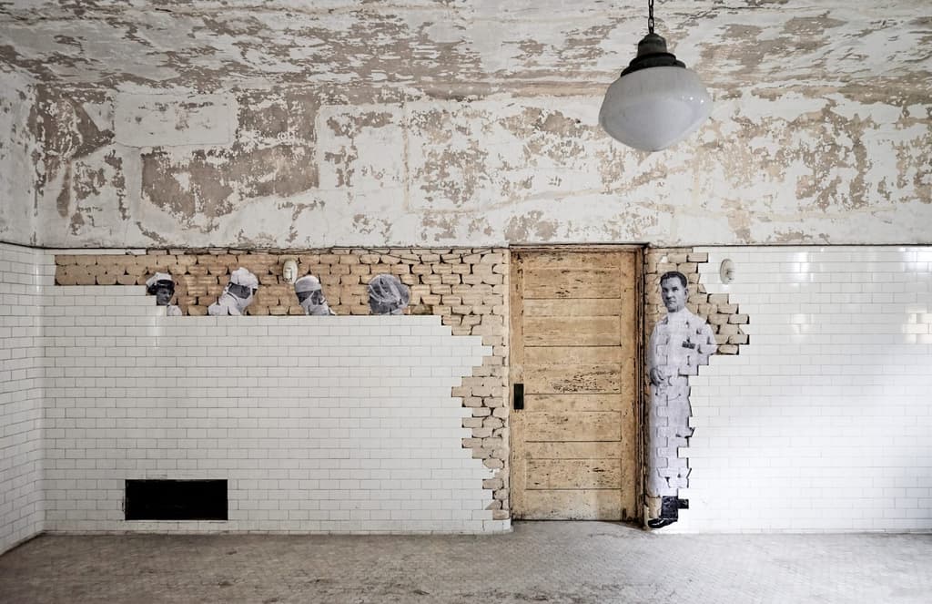 Artist JR brings the ghosts of Ellis Island to life in a new book