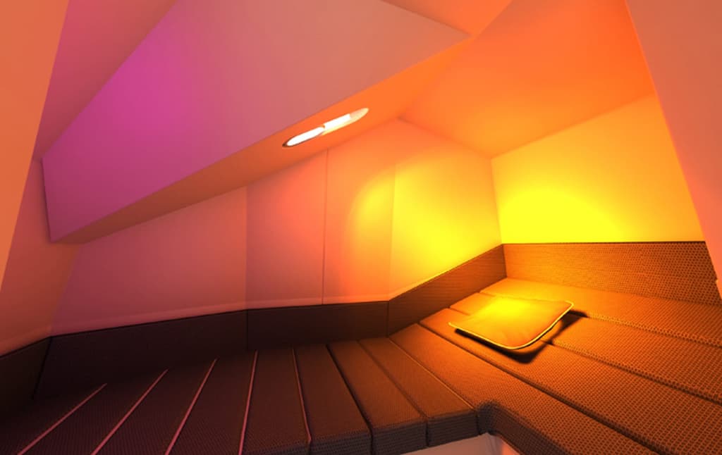 Haworth's CalmSpace sleeping booth, designed by Marie-Virginie Babet, comes equipped with preset lighting cycles and soundtracks designed to make it easier to fall asleep and then gradually wake back up