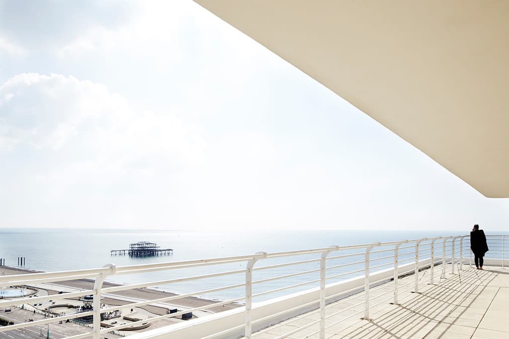 A view of the burnt down Brighton pier from the balcony of Embassy Court. Photography: Baker