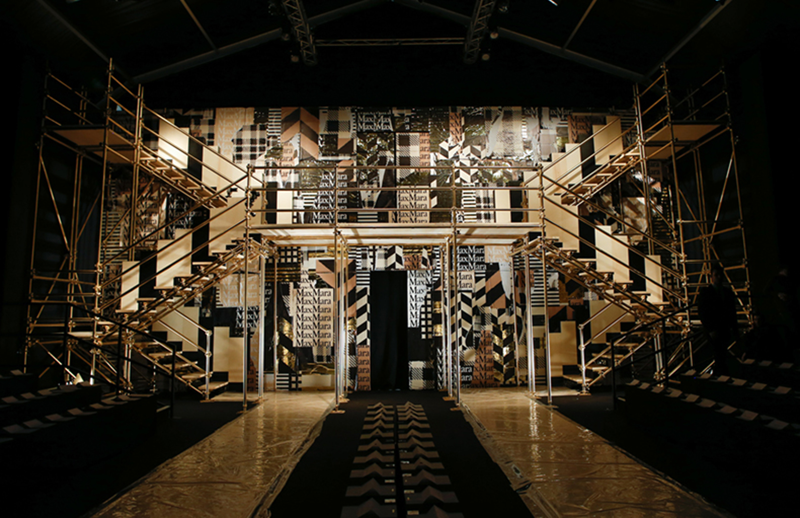 Chameleon Visuals created a gold-scaffolding set for MaxMara's AW16 catwalk show