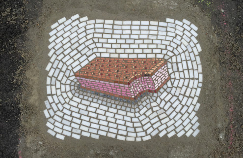 Chicago’s potholes are being filled with tiny artworks