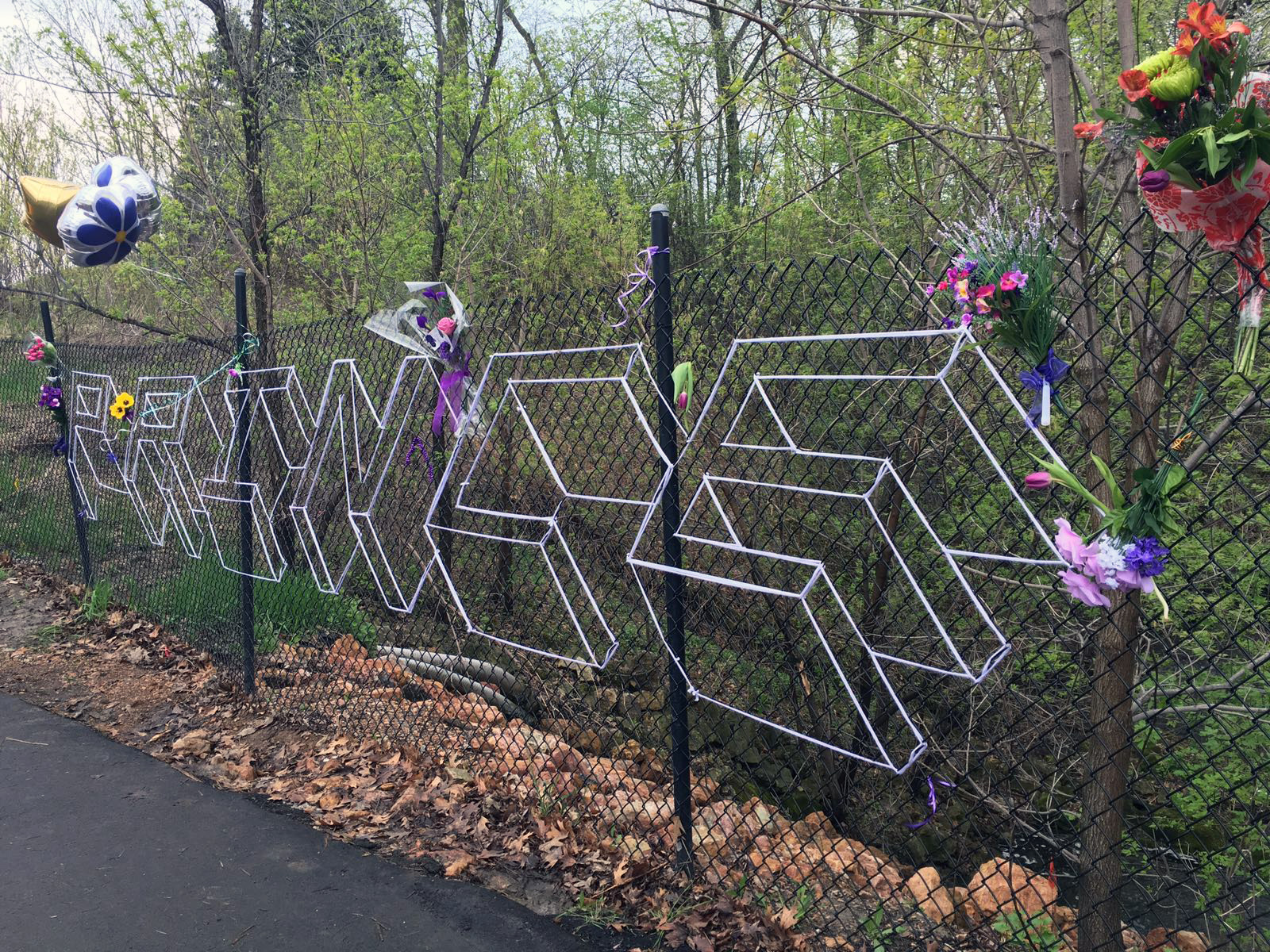 A fan tribute to prince on the chain-link fence outside Paisley Park. Photography: Tara McBride
