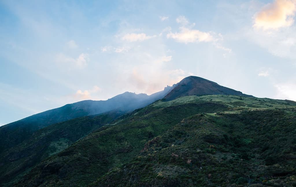 The approach to Stromboli. The volcano is active year-round and smoke/ash is visible