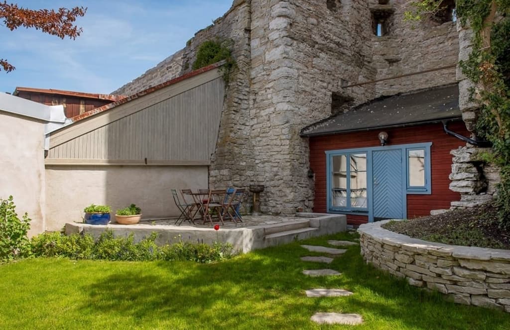 A holiday home embedded in medieval walls is on the market in Sweden