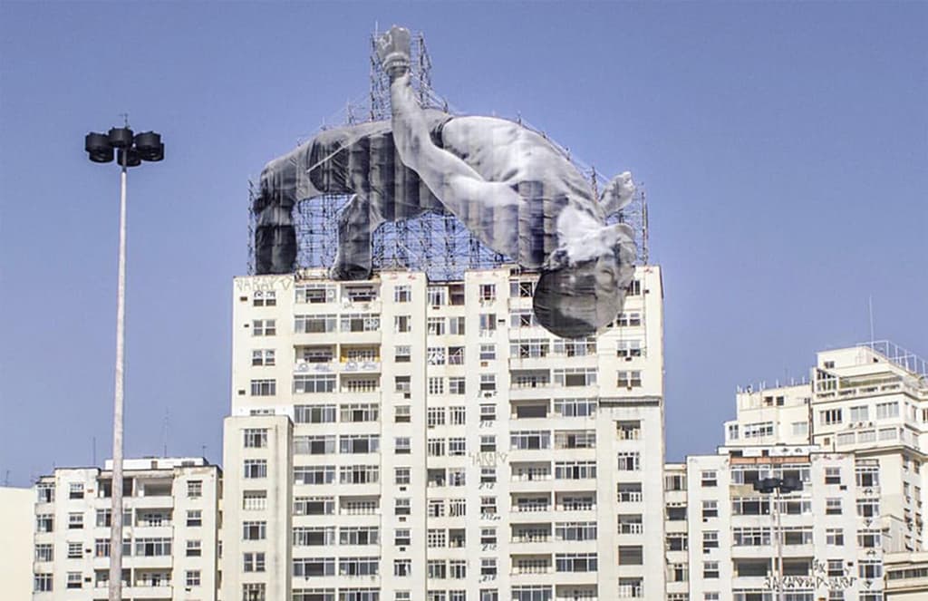 JR installs two giant athletes in sites across Rio for the Olympics Games