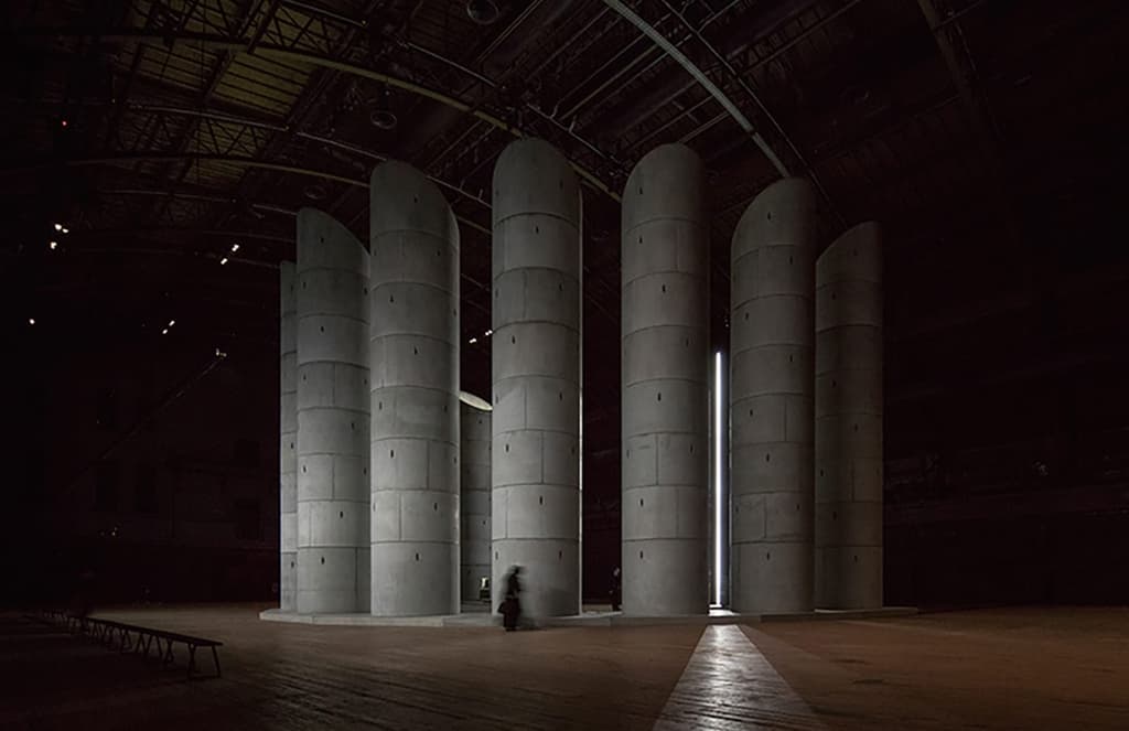Taryn Simon and OMA install 11 concrete wells for mourners in Park Avenue Armory