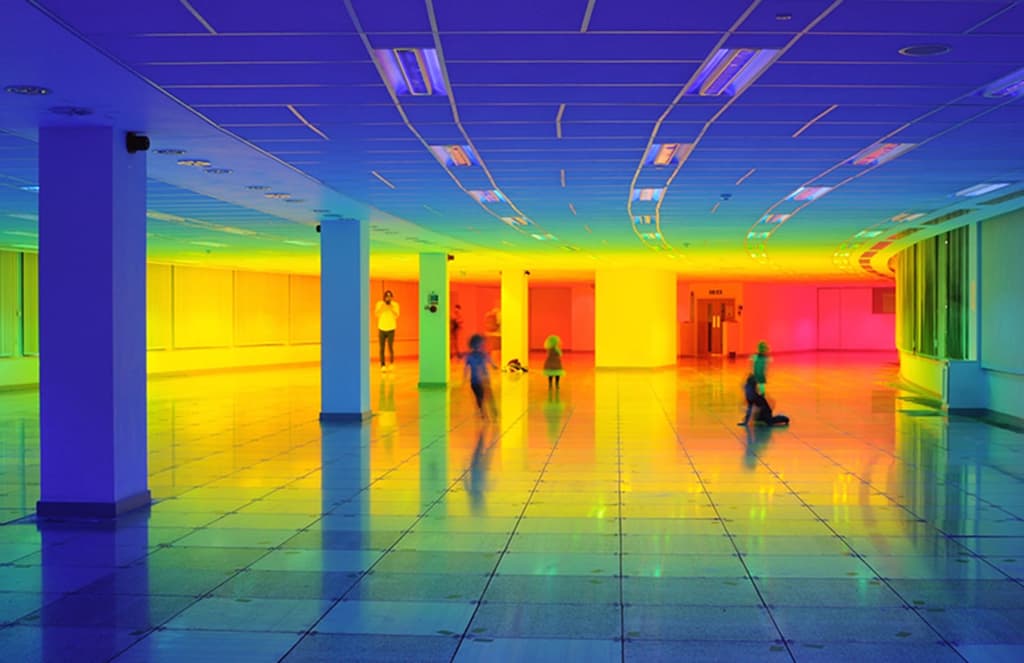 Artist Liz West creates a rainbow at the Bristol Biennial