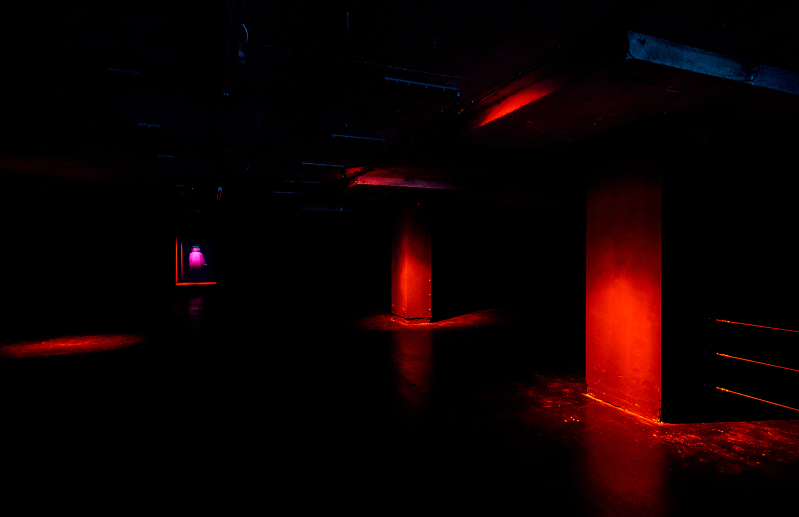 Dominique Gonzalez-Foerster's ghostly operatic hologram beckons viewers down a darkened corridor inside 180 The Strand. Photography: Michael Wilkin