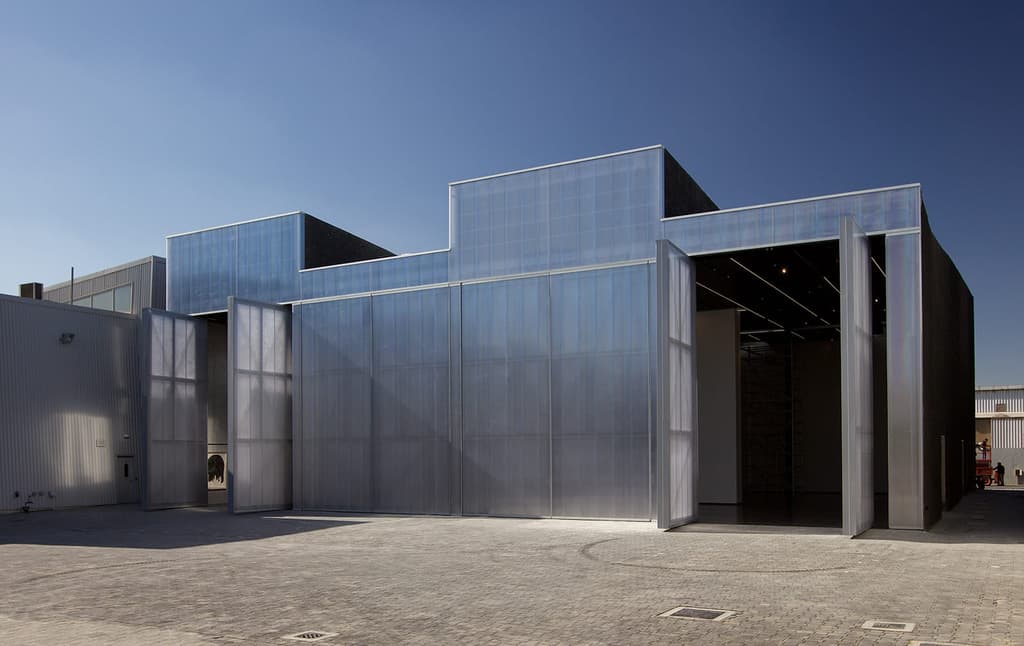 Concrete cultural space by OMA on Dubai's Alserkal Avenue