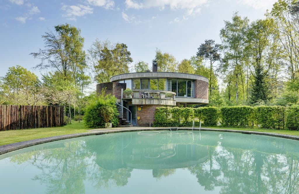 Brutalist hideaway in the woods of Antwerp lists for €649k
