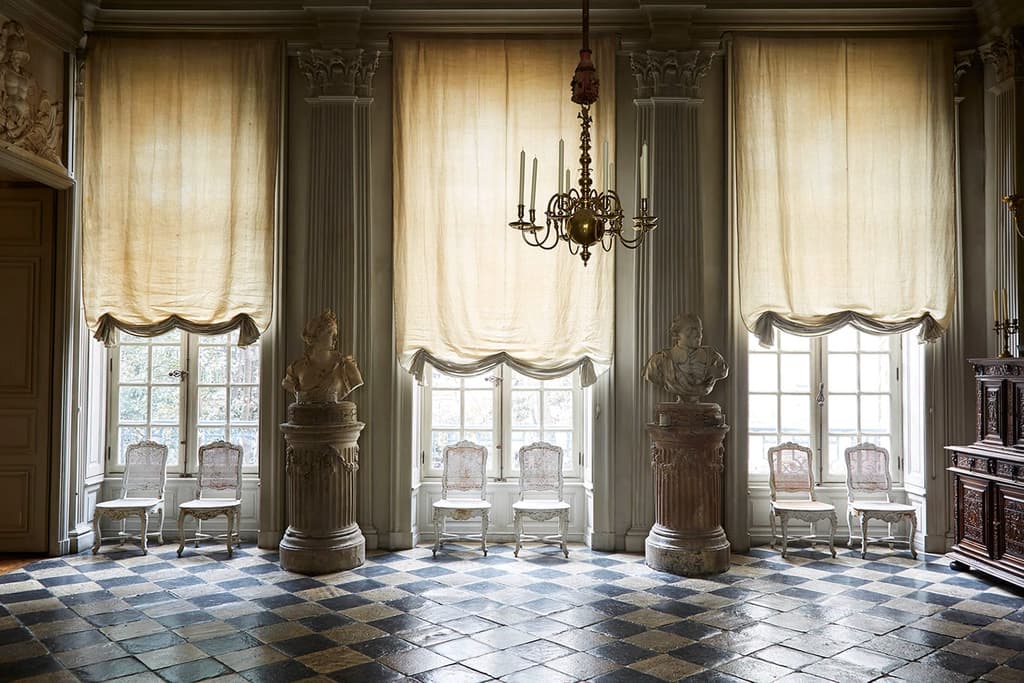 The grand entrance of Joseph Achkar and Michel Charriere’s Parisian home. Photography: Miguel Flores-Vianna