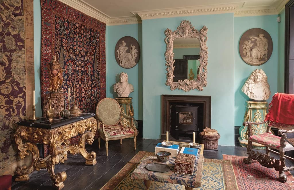 Howard Hodgkin’s living room, featuring collected items to be sold at Sotheby’s. Photography: Sotheby's