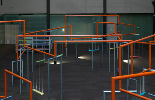 Superflex hangs giant swings inside Tate Modern’s Turbine Hall