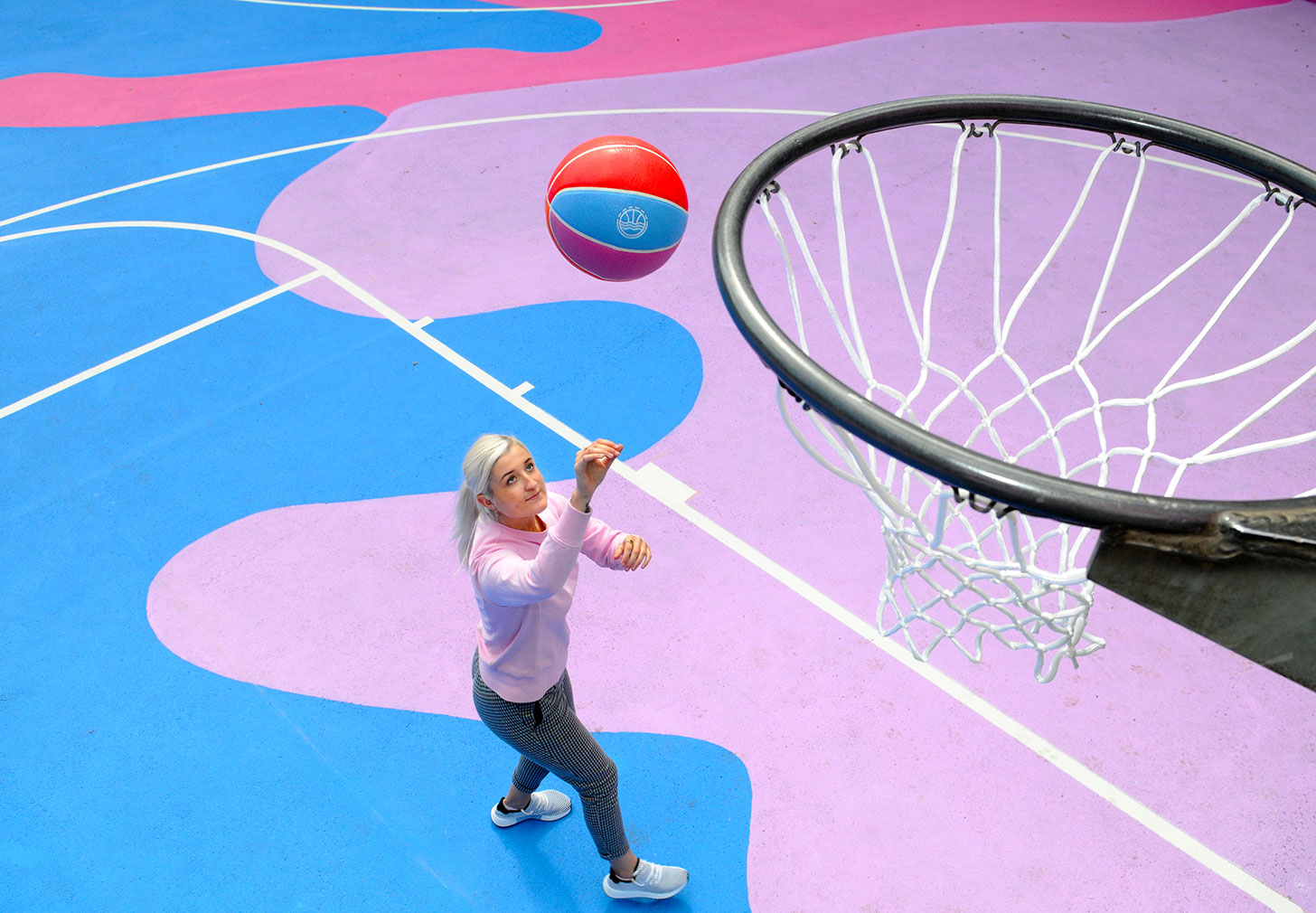 Lois O’Hara gives a Brighton basketball court a colour injection