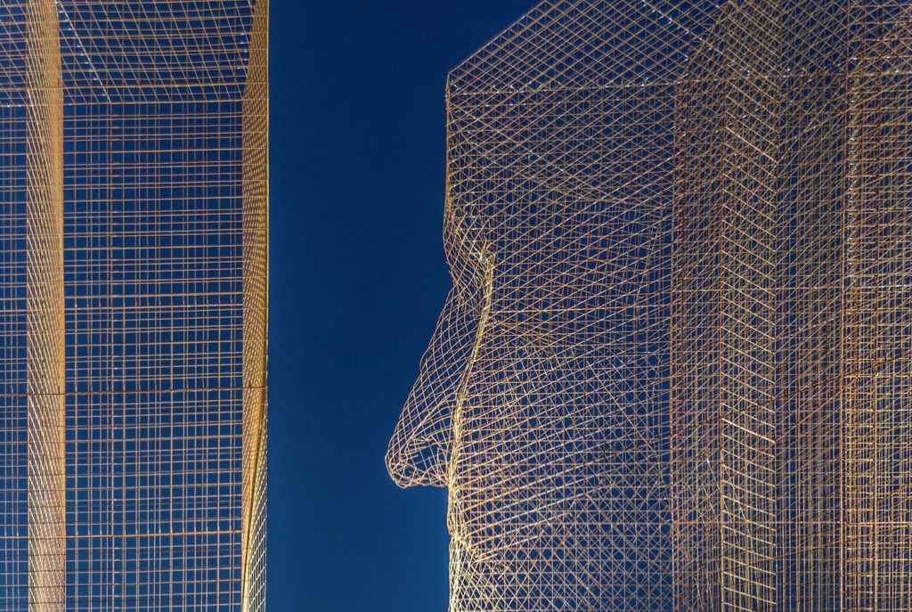 Giant faces watch over Barcelona in Edoardo Trisoldi’s latest installation