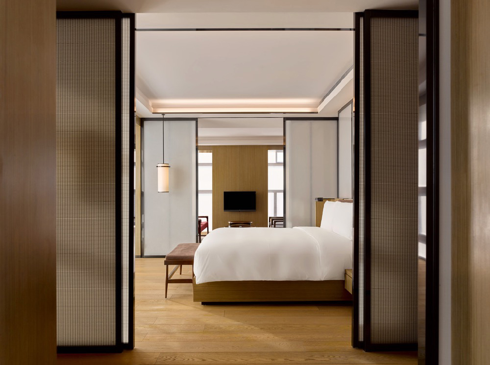 A bedroom inside the PuXuan Hotel and Spa 