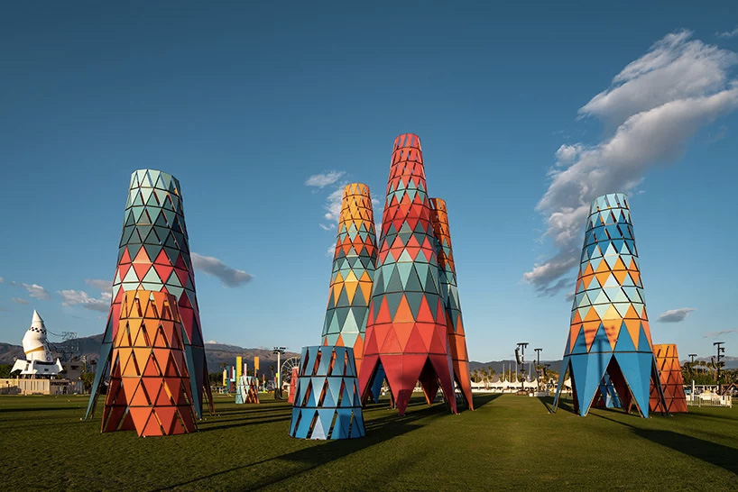 Architect Francis Kéré has designed a ‘forest’ of brightly coloured shelters at desert arts and music festival Coachella, inspired by the baobab tree.