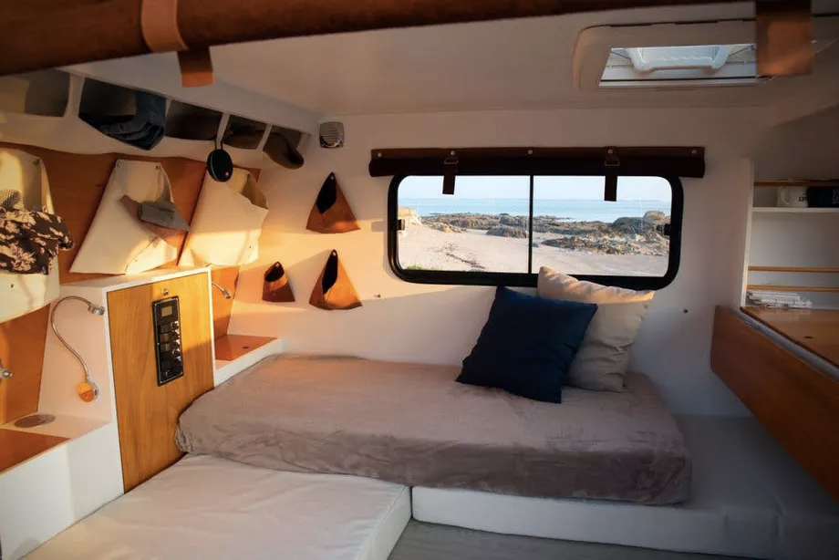 This lightweight trapezoid camper by Carapate Adventure in inspired by a boat