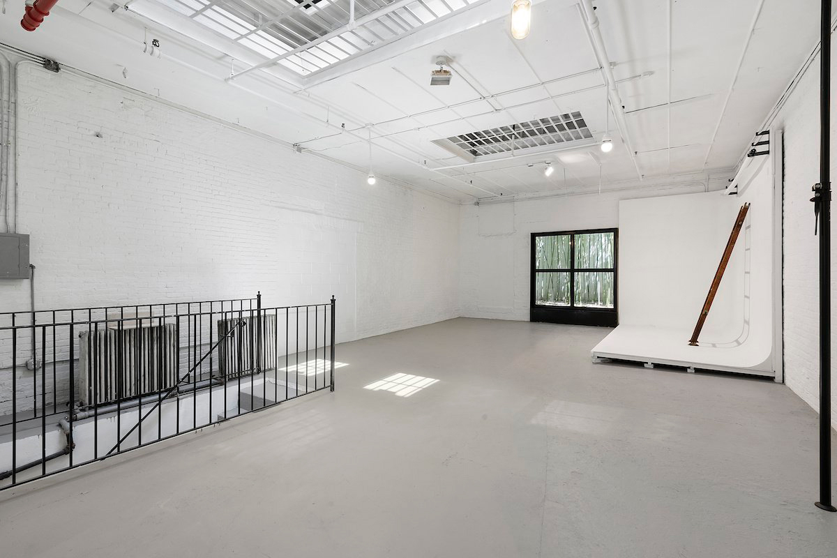 A 1,350 sq ft basement space, which could potentially be used as a gym, studio, or office.