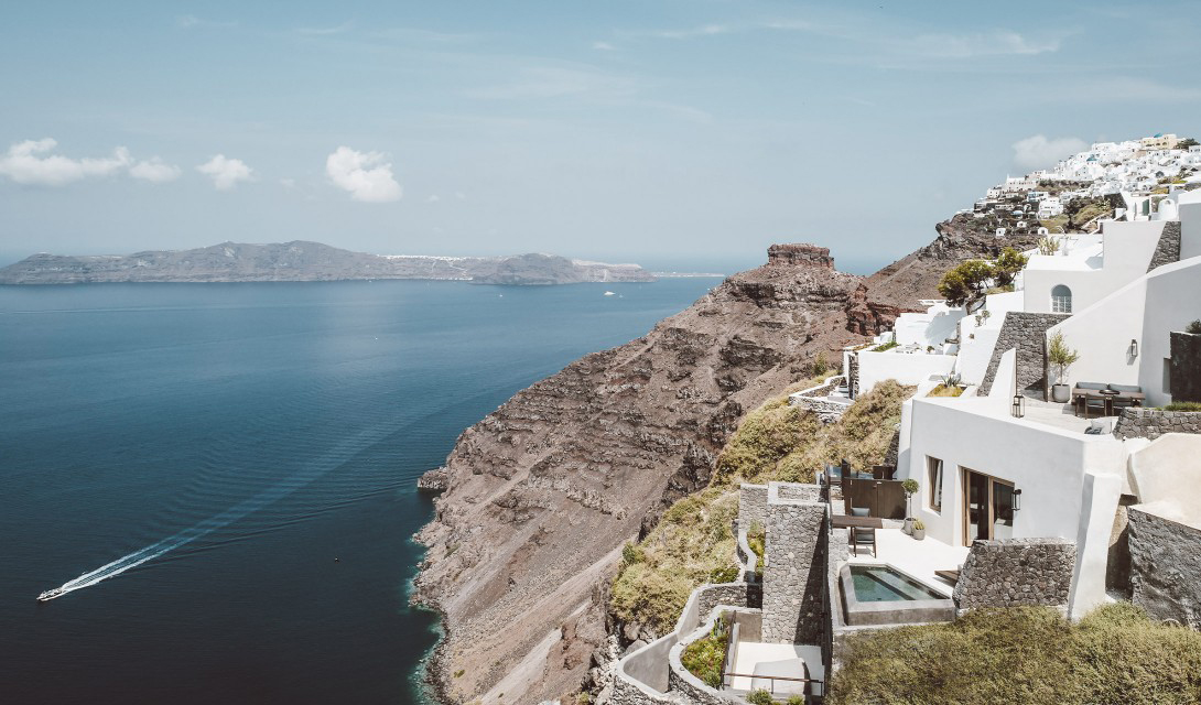 Villa Vora is an angular retreat carved into a volcanic clifftop in Santorini
