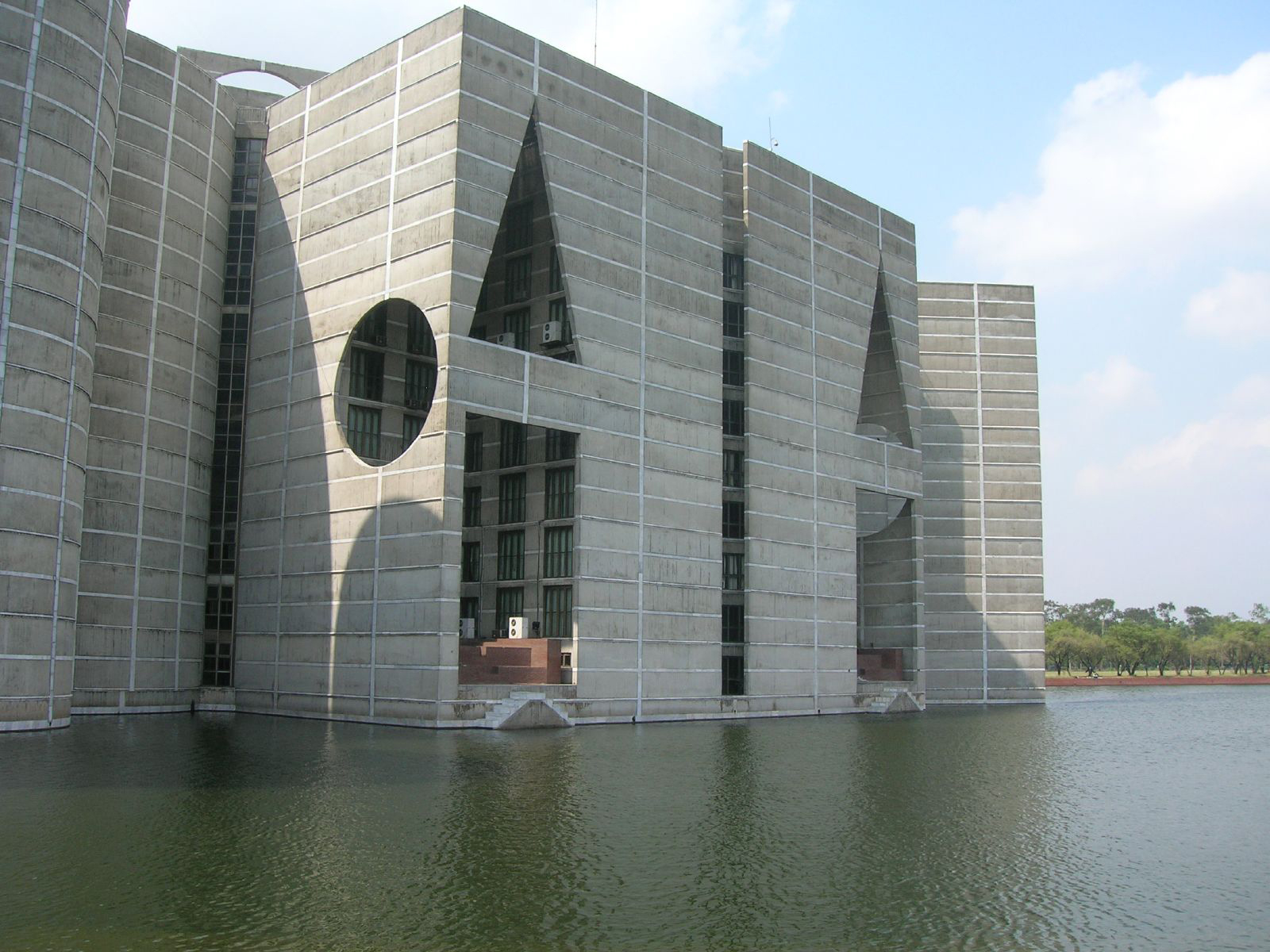 The modernist Jatiya Sangsad Bhaban or National Parliament House of Bangladesh, designed by Louis Kahn and Muzharul Islam