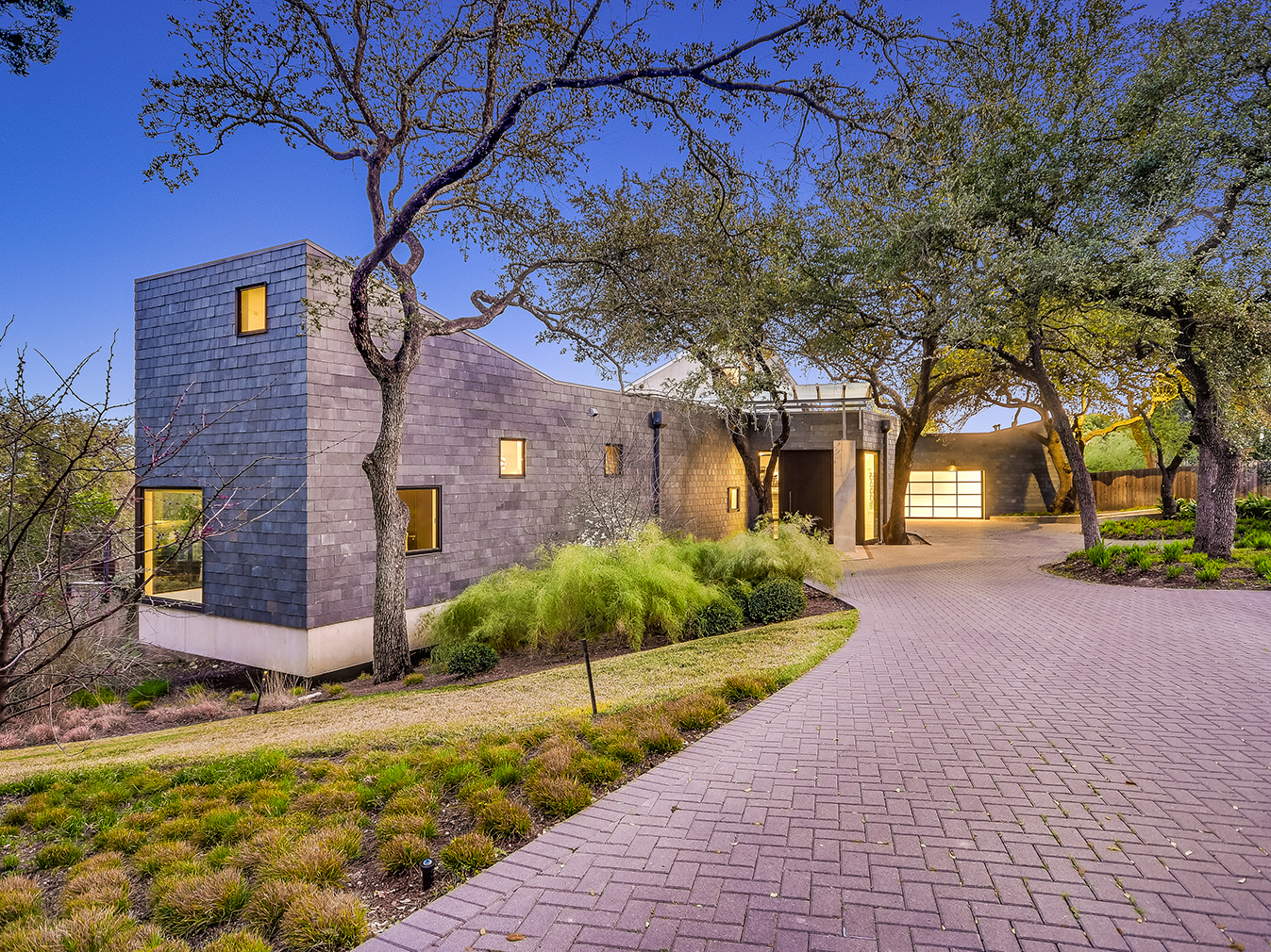 A writer's brutalist Austin estate blends barn and loft living