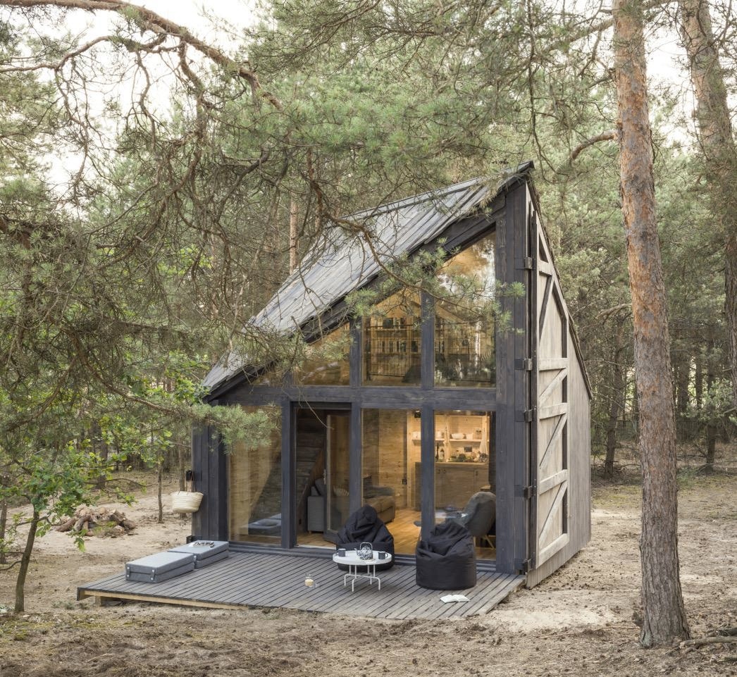Bookworm Cabin is a miniature library in the woods outside Warsaw