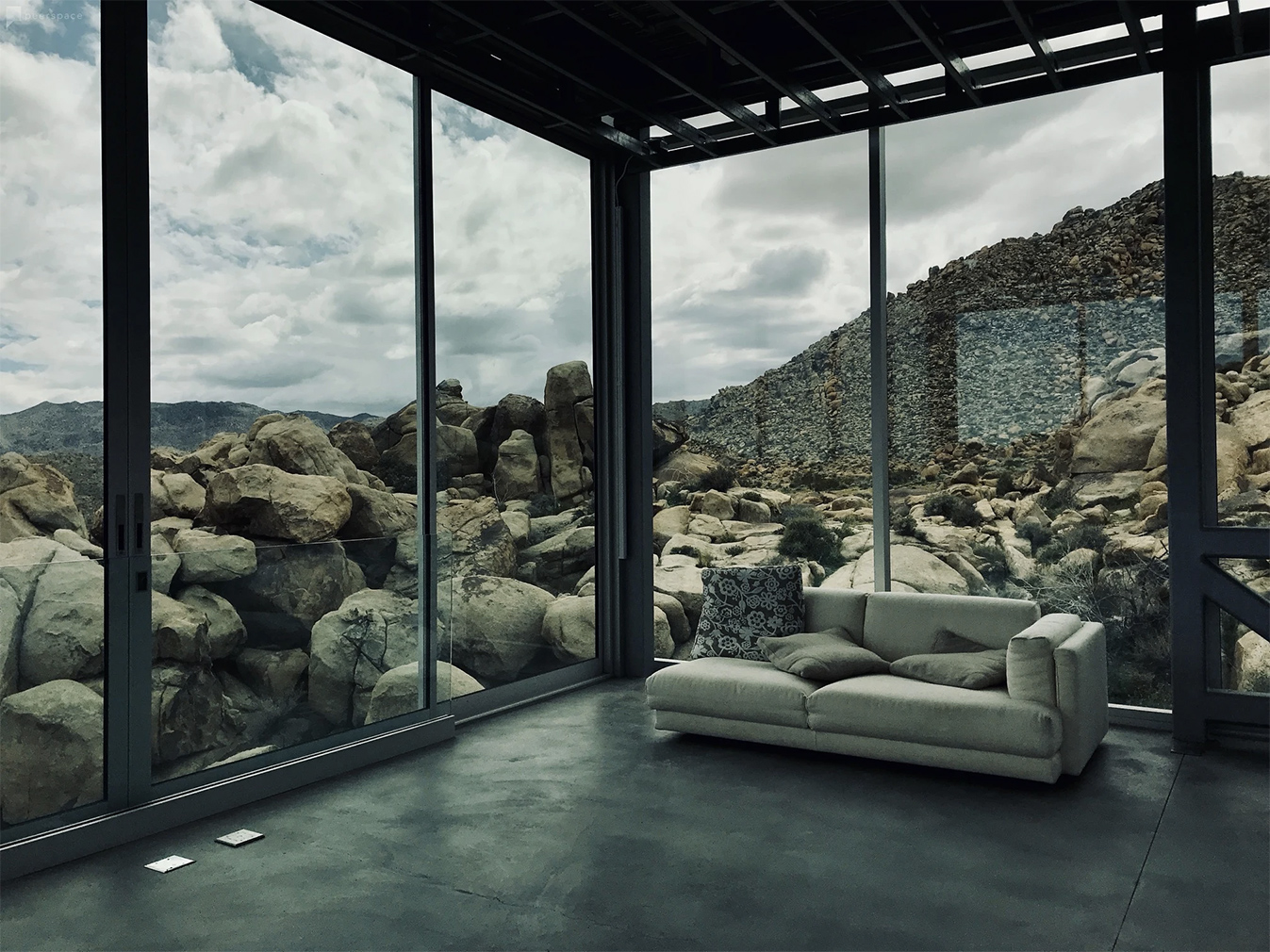 Invisible House reflects the Californian desert from its mirror-clad walls