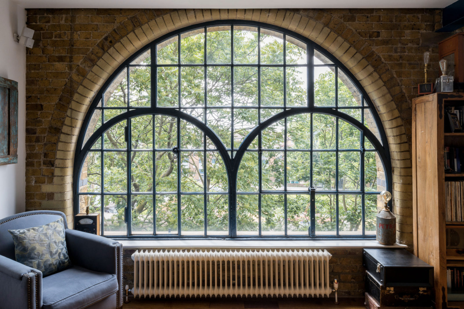 Industrial windows steal the show inside this London loft - for sale via The Modern House