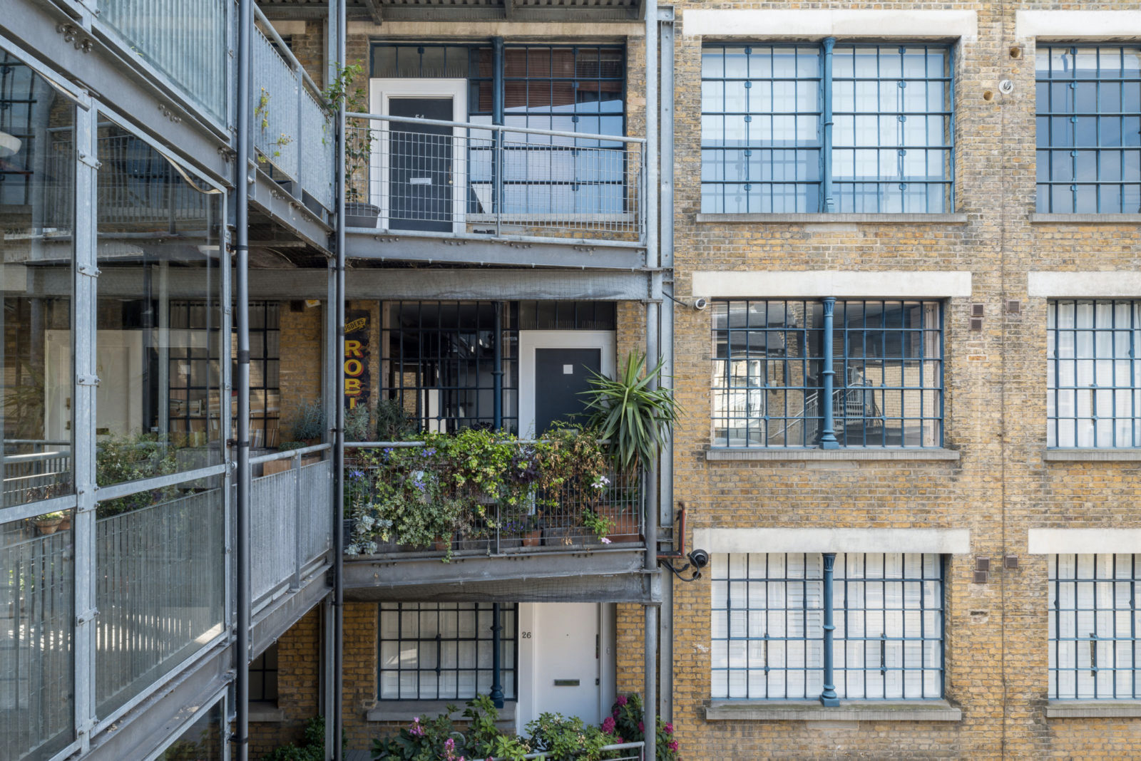 Industrial windows steal the show inside this London loft - for sale via The Modern House