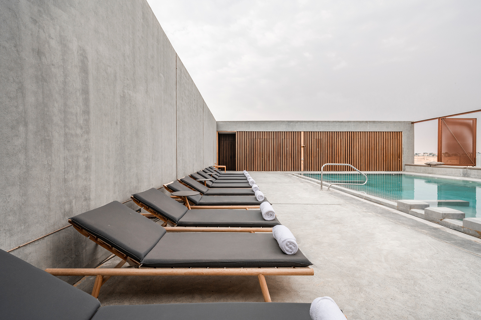 The concrete swimming pool and area at Al Faya Lodge, UAE
