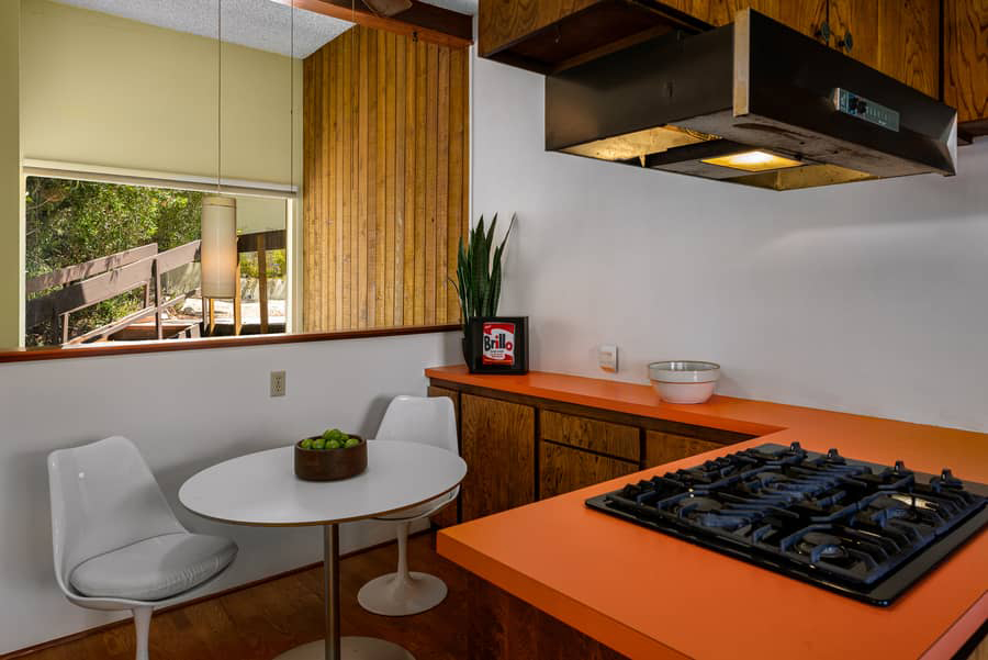 Formica worktops, tongue-and-groove ceilings, wood-panelled walls and salvaged cabinetry fashioned from stereos are just some of the original midcentury modern features inside the 2,5000 sq ft home