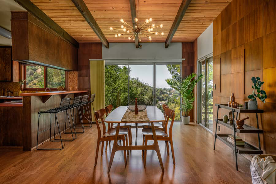Formica worktops, tongue-and-groove ceilings, wood-panelled walls and salvaged cabinetry fashioned from stereos are just some of the original midcentury modern features inside the 2,5000 sq ft home