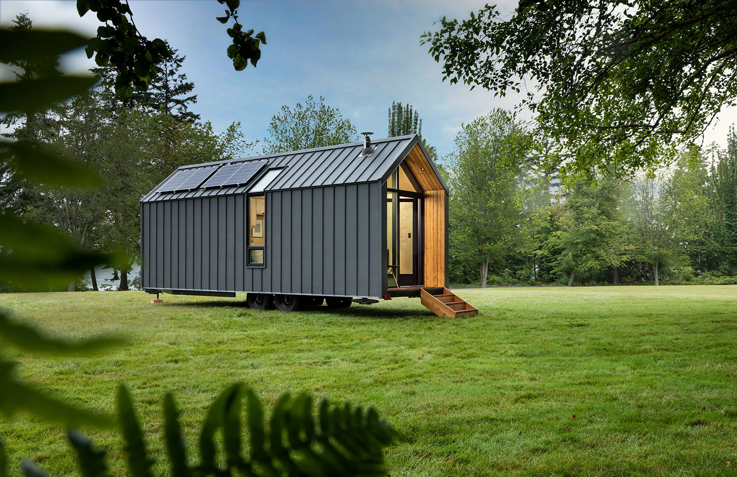 Modern Shed has released a towable prefab cabin, complete with a gable roof and wood-burning stove