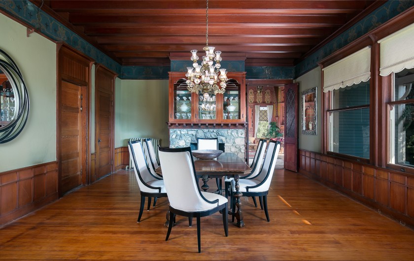 Period details such as hardwood ceilings, wall panelling and tiled fireplaces are all intact